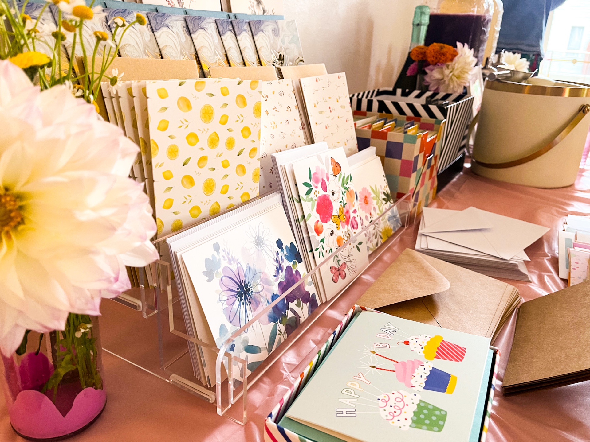 Card display with watercolor florals and fresh dahlias